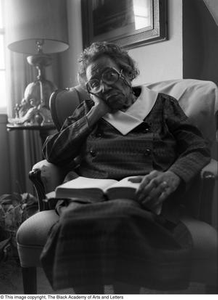 Photograph of Mable Chandler reading a book #3