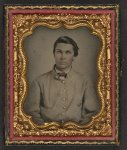 [Unidentified young soldier in Confederate sack coat]