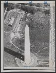 This aerial view shows demonstrators gathered near the Washington Monument (foreground) for the start of March on Washington ceremonies here 8/28. Entertainers are performing on the stage at upper right. The tent at upper left is March headquarters