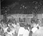 Crowd gathered at a puppet show at the Alabama Baptist State Convention booth at Garrett Coliseum during the 1970 South Alabama Fair in Montgomery, Alabama.