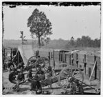 [Atlanta, Ga. Federal soldiers relaxing by guns of captured fort]