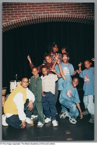 Photograph of youths posing for their portrait