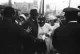 Mahalia Jackson and others on Auburn Avenue, just west of Ebenezer Baptist Church on the day of Martin Luther King, Jr.'s funeral.