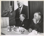 William Dawson speaking, Richard J. Daley and Bill Milota listening