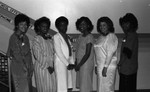 Assistance League event attendees posing for a group portrait, Los Angeles, 1986