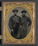 [Two unidentified soldiers in Mississippi battle shirts with double barrel shotguns, knives, and powder horns]