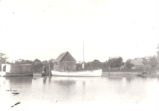 African-American Man By Boat