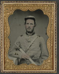 [Unidentified soldier in North Carolina uniform with sword and revolver]