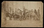 [Six Union musicians of the 4th Vermont Infantry Regiment relaxing at camp in a pine forest in Virginia]