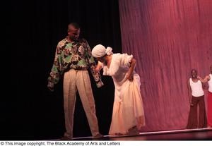 Dancer in white dress with groom dancer