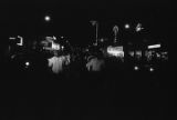 Richard Boone, Lula Williams, and others, marching down Montgomery Street in downtown Montgomery, Alabama, during a civil rights demonstration.