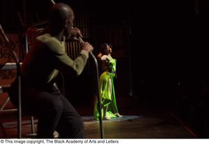 Performer in green dress dancing