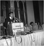 Thumbnail for Muhammad Ali, State Senator Leroy Johnson, and Hank Aaron at a press conference in Atlanta, Georgia, August 1970.