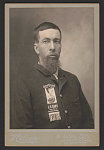 [Civil War veteran Alfred Colburn of Co. K, 1st Minnesota Infantry Regiment and 2nd Minnesota Light Artillery Battery with J.S. Cady Post No. 2 ribbon]