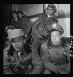 [Photograph of Tuskegee airmen attending a briefing in Ramitelli, Italy, March 1945]