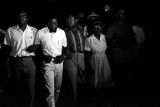 Ralph Abernathy, Annie Devine, Floyd McKissick, and others, participating in the "March Against Fear" through Mississippi at night.