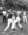 "Two street gangs hold boxing matches sponsored by civic groups"