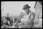 Mixed-breed Indian, white and Negro, near Pembroke Farms, making new chair seat. North Carolina