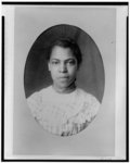 [African American girl, head-and-shoulders portrait, facing front]