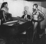 Musician with chorus girls