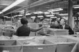 Governor Albert Brewer shaking hands with an employee during a tour at the Simon & Mogilner garment factory in Birmingham, Alabama.