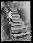 [Untitled photo, possibly related to: Negro child residing in old Trepagnier house near Norco, Louisana]