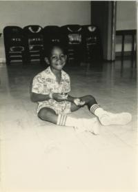 Child Sitting on the Floor