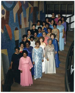 Links Members in Formal Attire on Staircase