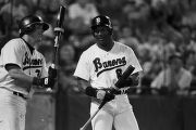 Thumbnail for Bo Jackson with a teammate during a Birmingham Barons baseball game in Birmingham, Alabama.