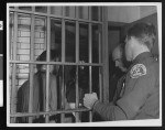 Thumbnail for Los Angeles County sheriff opens a cell to release Ben Dobbs, Nov. 4, 1948, Hall of Justice, Los Angeles