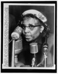 Mrs. Annie Lee Moss, suspended government worker, shown testifying before the Senate Investigating Subcommittee ...