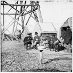 [Bermuda Hundred, Va. Officers by their quarters near the signal tower]