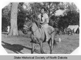 Era Bell Thompson on horseback, Mandan, N.D.