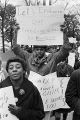 Demonstrators marching toward the Jefferson County Courthouse in downtown Birmingham, Alabama, for a voter registration rally.