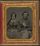 [Unidentified soldier in Union uniform and his wife]