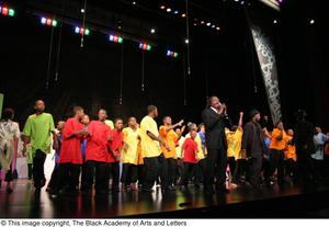Curtis King on Stage with Young Performers