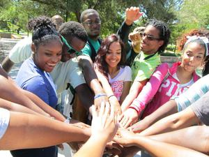 Group circle chant at BSE Training