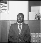 African American automobile salesman posing for a portrait, Los Angeles, 1971