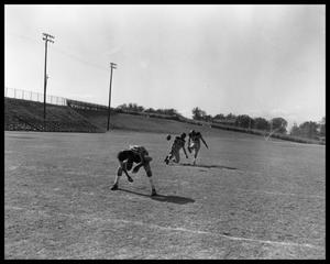 Three Anderson High School Student Playing Football