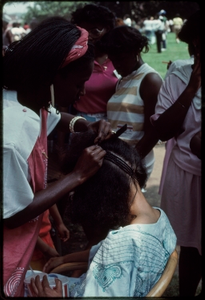 Atlanta, Georgia, 1988: National Black Arts Festival. African American hair braiding