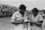 B. B. King: Parchman Penitentiary, Miss. B. B. King performing, greeting fans, signing autographs, guards, B. B. King reclining in living room (BKP 80-2)