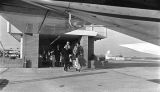 Martin Luther King, Jr., being interviewed at the airport in Montgomery, Alabama.