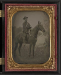 [Unidentified soldier in Union uniform with saddle pistols and canteen on horseback]