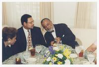 Unidentified Woman and Two Men at Commencement Event, 2001