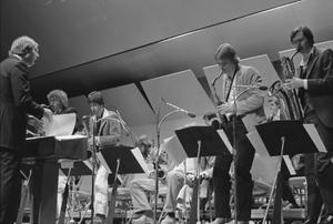 Photograph of Neil Slater and Four Saxophonists