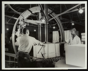 Thumbnail for Leroy Brown and John Williams operating automatic banding machine at Hercules Hopewell plant