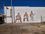 Mural by "R. Brower" depicting blues musicians in Clarksdale, Mississippi