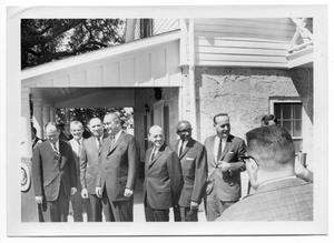 Lyndon Johnson Standing with a Row of Men