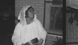 Fannie Bell Chapman: Centreville, Miss. Chapman family outside home, prayer service. Color (FCP 2-72-7 #410)