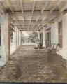 Photograph; Patience and Amy under front Piazza.